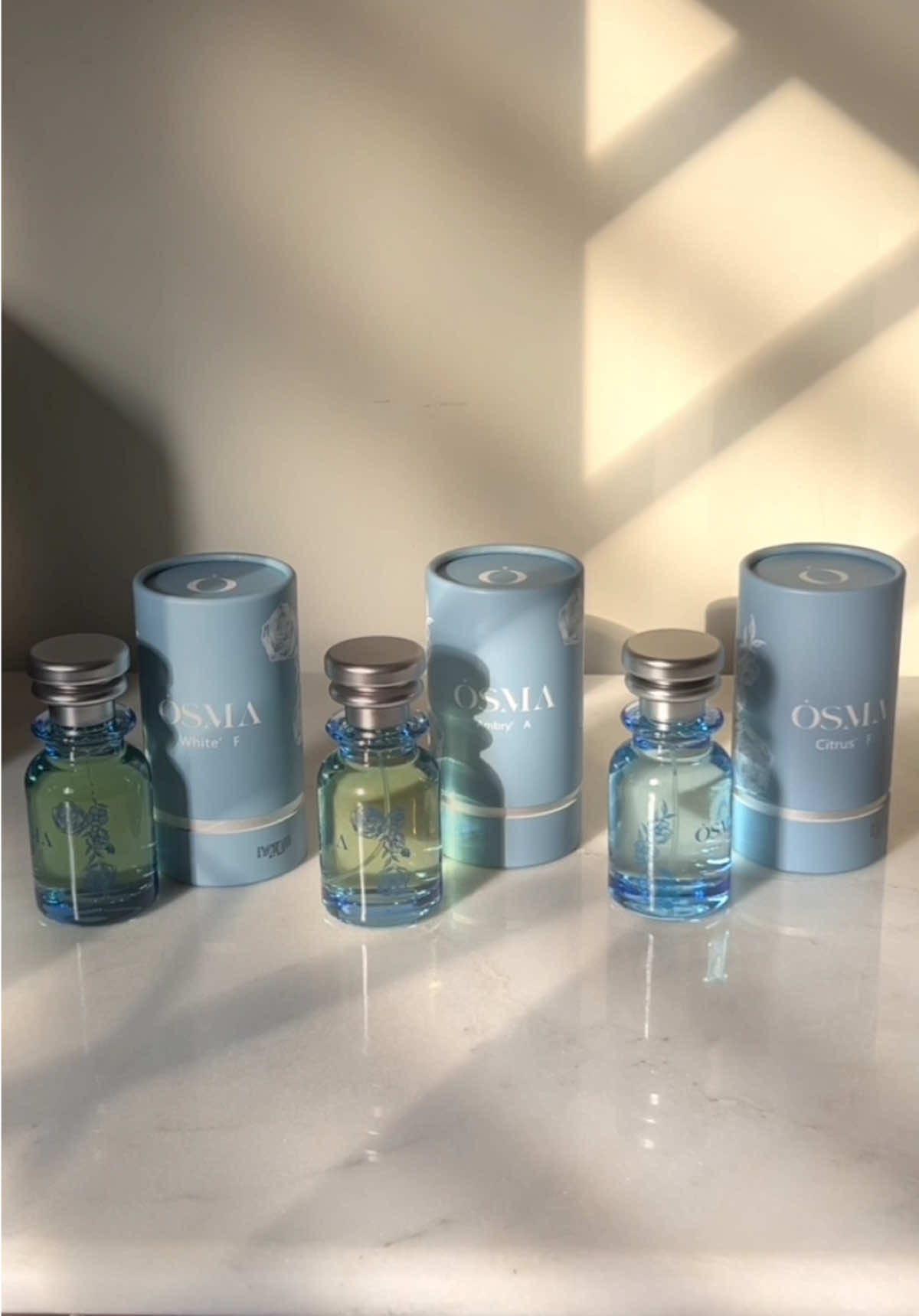 TikTok post by @rym163 for Osma Perfumes. Caption reads: مجموعة أمبر تتش من اوسما 3 عطور ب 175 ريال !....