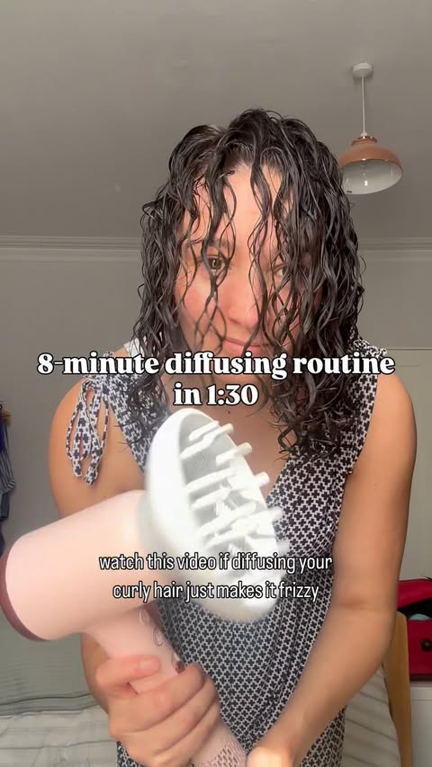 Instagram post by @curlsbythecoast for WavyTalk. Caption reads: [...] as cause more frizz. My hairdryer:....