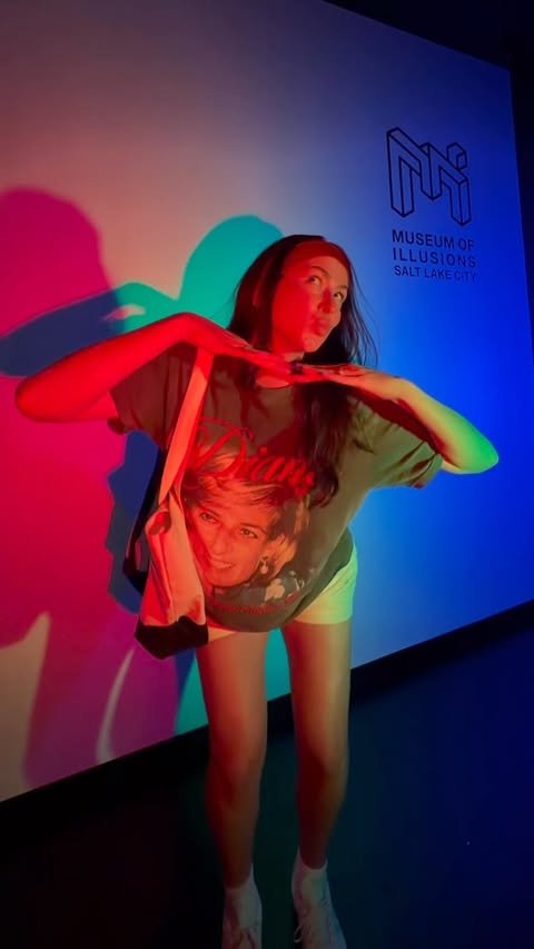Instagram post by @queenofslc_ for Museum of Illusions. Caption reads: [...] @lauramstumpy I’ve teamed up with....