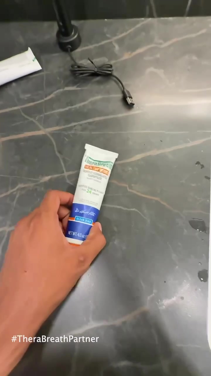 TikTok post by @sl4ught3r for TheraBreath. Caption reads: @TheraBreath US NEW Healthy Gums Toothpaste and....