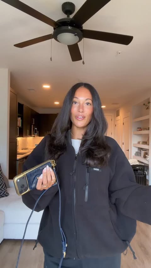 Instagram post by @janayerob for BANDOLIER. Caption reads: [...] style with my cross body phone case by....