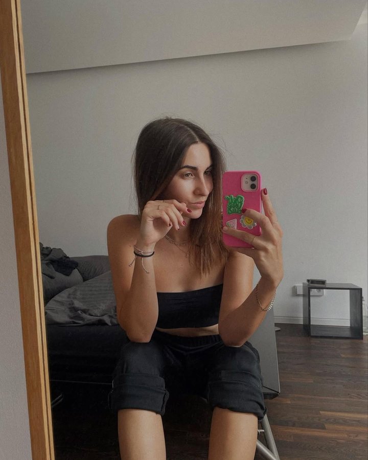 Instagram post by @anna.amparo for Holdit. Caption reads: Ad | self-love-club x @holditbrand 💖 • • •....