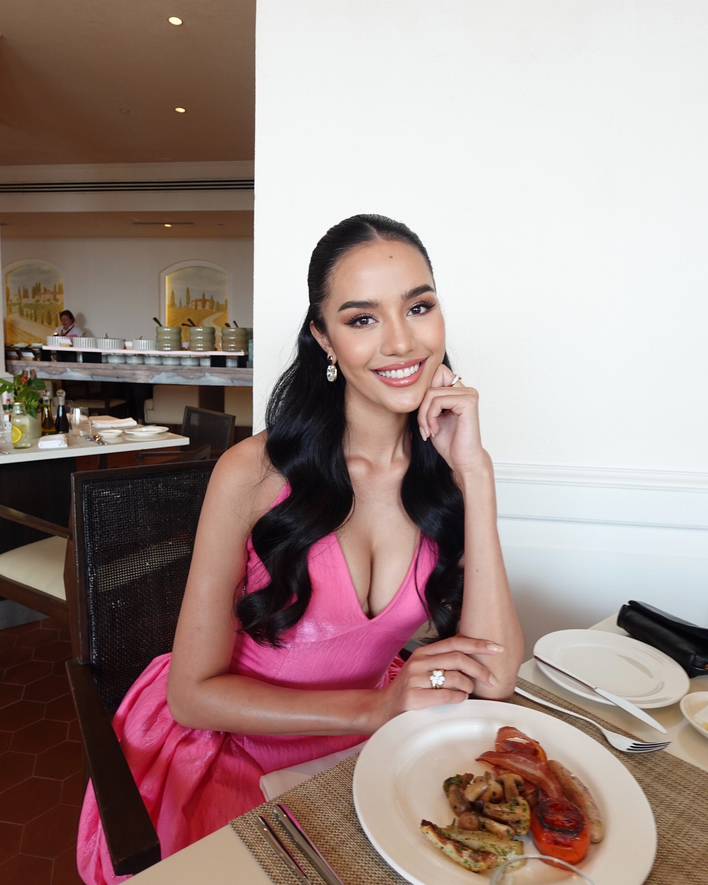 Instagram post by @suchaaata for SWAROVSKI. Caption reads: So grateful for the first breakfast at @missworld....