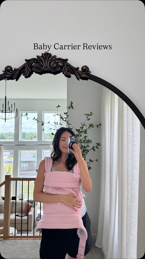 Instagram post by @sydneylotuaco for WILDRIDE. Caption reads: Baby Carrier Reviews 🤰🏻🦘Not saying you need....