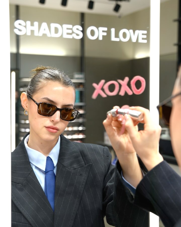 Instagram post by @ece.imre for Sunglass Hut. Caption reads: wear your sunglasses on, couples are everywhere....