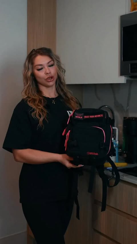 Instagram post by @xo_kailee for WOLFpak. Caption reads: @wolfpak.official made for on the go 🐺🖤 The 9L....
