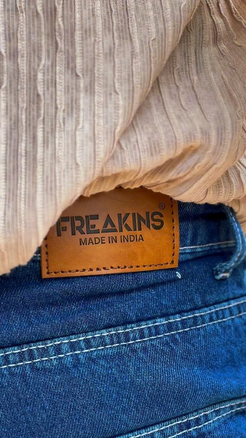 Instagram post by an influencer for Freakins. Caption reads: [...] perfect pair of denim.”💥👖 @freakinsindia....