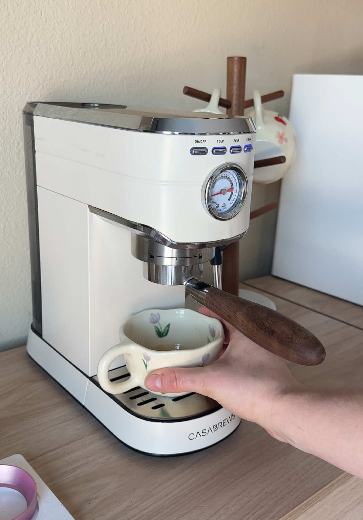 TikTok post by @coffeebyhailey for Casabrews. Caption reads: Morning coffee on my Casabrews CM5418 espresso....