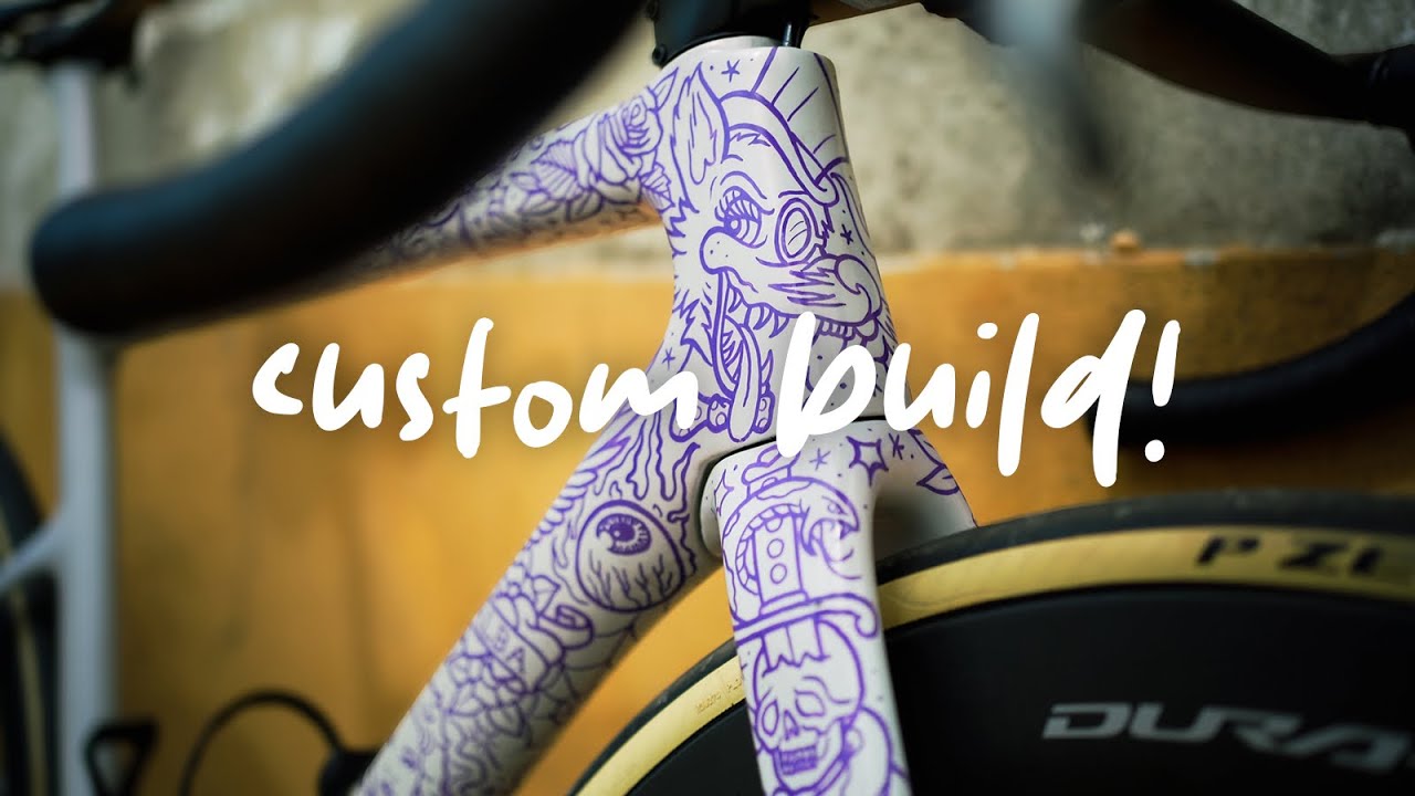 YouTube post by @TheCyclingTattooist for Styrkr. Caption reads: I TATTOOED MY BIKE!.