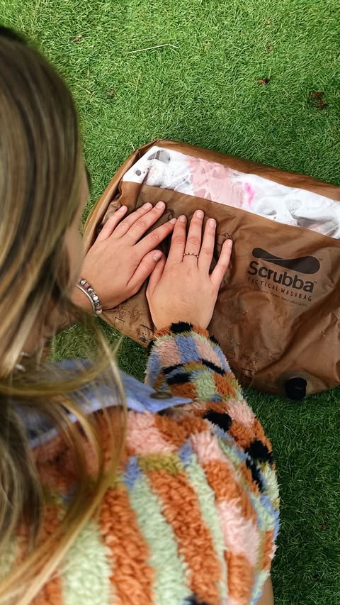 Instagram post by @heidijoannee for The Scrubba. Caption reads: [...] full-time in a van? Introducing the Scrubba....