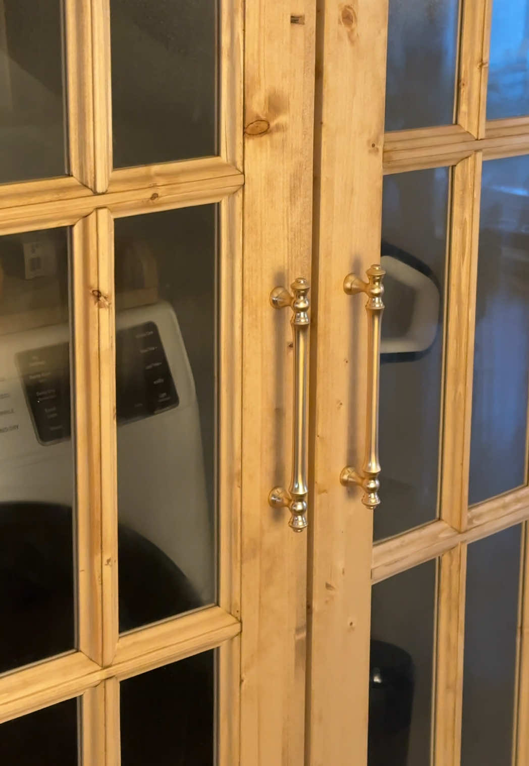 TikTok post by @stylebybrimarie for Wayfair. Caption reads: upgrading my laundry room bifold doors 🚪✨....