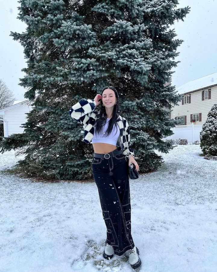 Instagram post by @bellachevarie for Urban Planet. Caption reads: [...] ❄️🌲

Full outfit gifted from @urbanplanet....