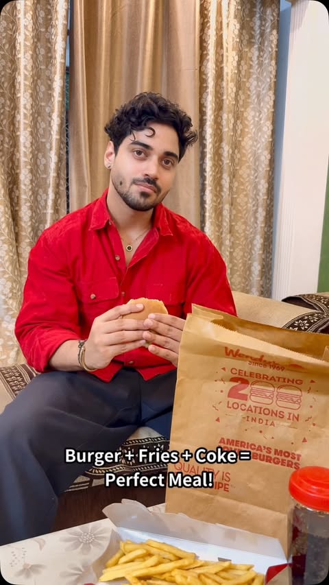 Instagram post by @prashant_stayreal for Wendy's. Caption reads: Not every burger gets a second order from me… This....