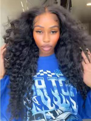 TikTok post by @brakiamoore for Bangjazzhair. Caption reads: I love some fullll thick hair 😍😍🔥 @bangjazzhair....
