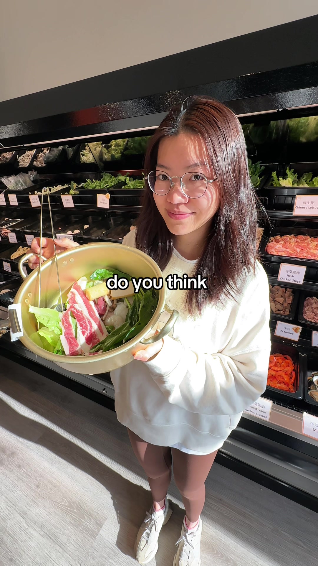 TikTok post by @darius.vlogs8 for Soundcore. Caption reads: Guessing how much our hotpot costs #soundcore....