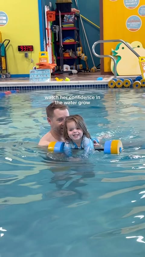 Instagram post by @themodernlatinamama for Goldfish Swim School. Caption reads: [...] be in the water with Eric. 🙌 -....