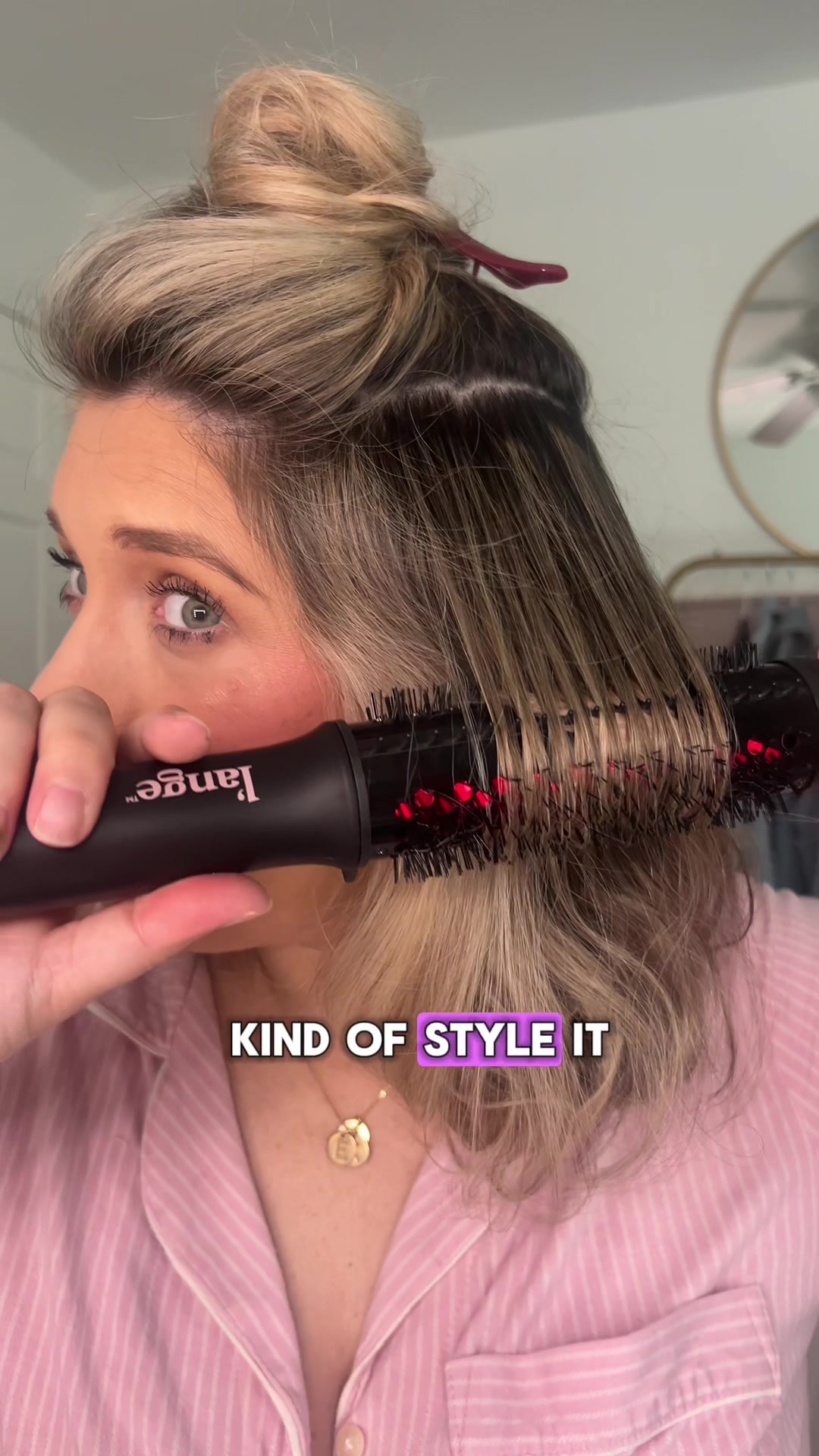 TikTok post by @sydneydanielle33 for L’ange Hair. Caption reads: [...] allllll the volume!! 😍👏🏼 @langehair....