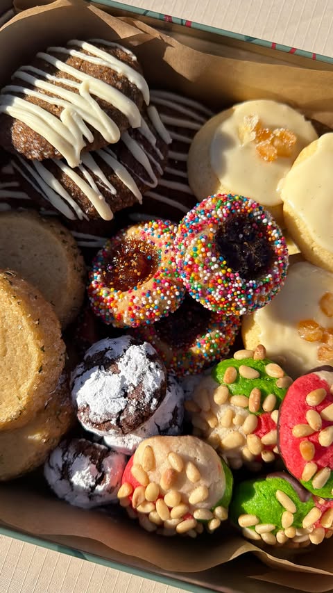 Instagram post by @haileecatalano for KerrygoldUSA. Caption reads: [...] holiday cookie box with the best....