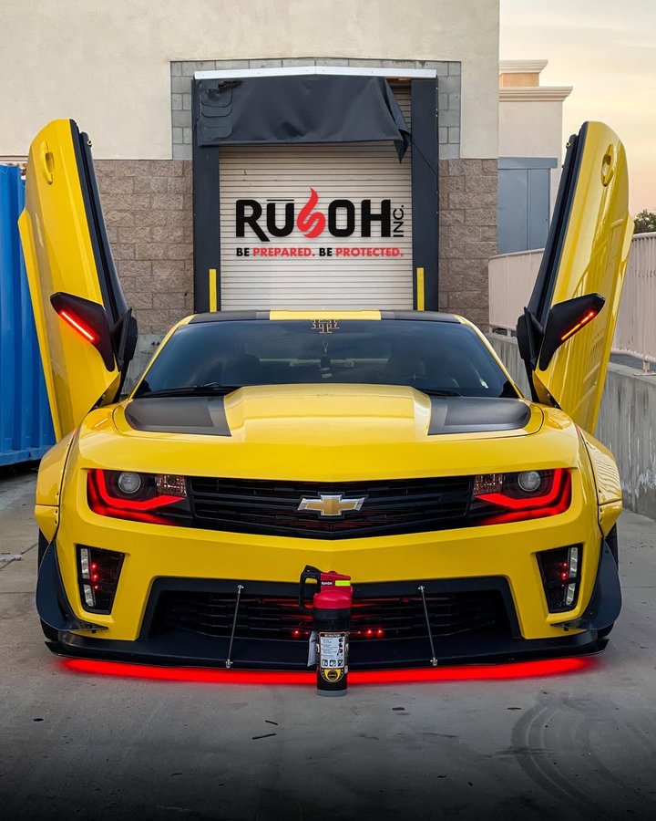 Instagram post by @tfbeecamaro for Vertical Doors Inc. Caption reads: Whether at a show or track day… The @eliminatorllc....