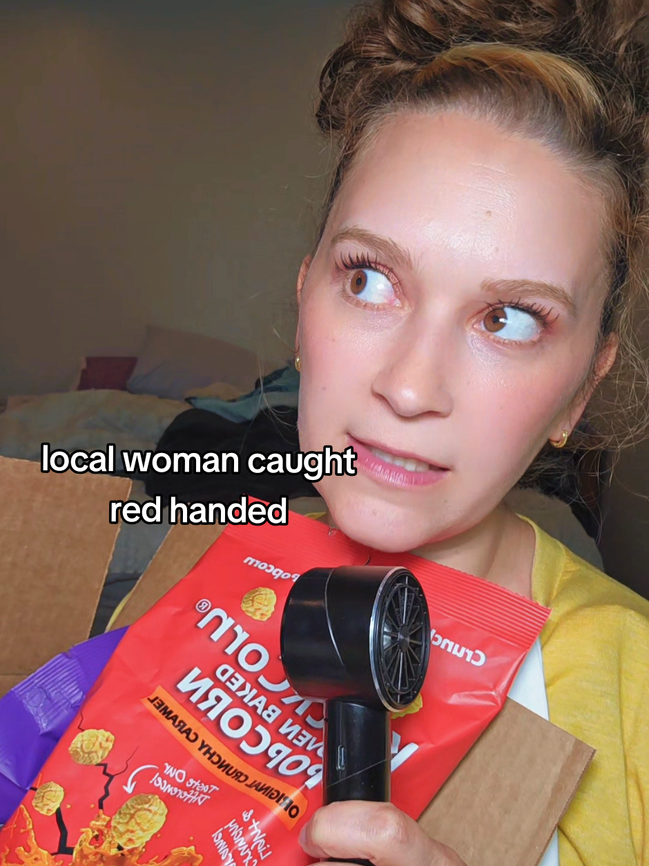 TikTok post by @whitney_speaking for KrackCorn Popcorn. Caption reads: These @KrackCorn Popcorn are some of the BEST....