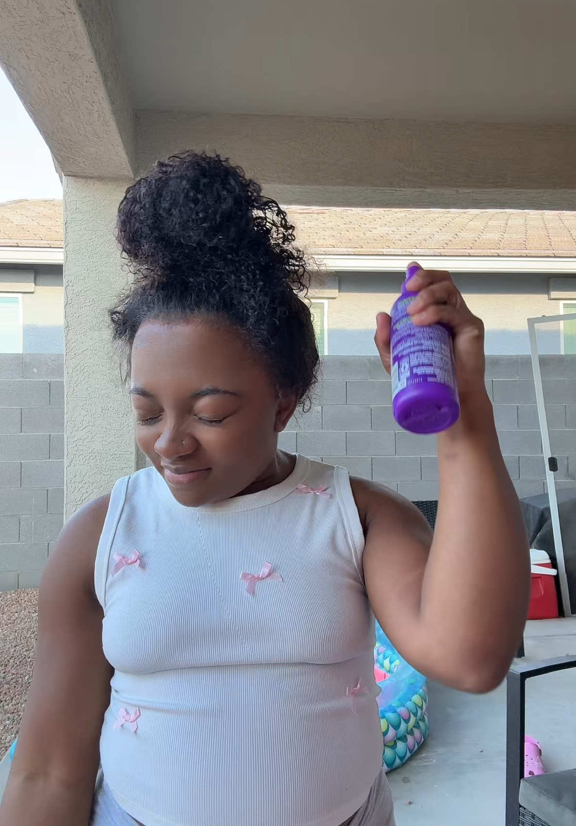 TikTok post by @mama_loux2 for Ashimary Hair. Caption reads: A wig that keeps you cute and COOL in the....