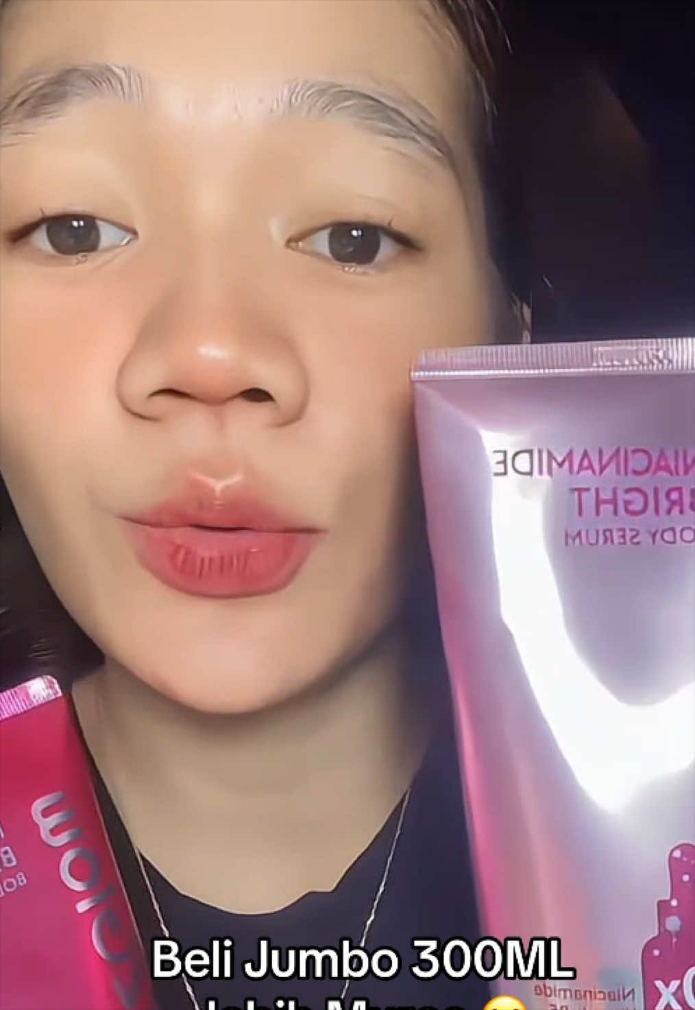 TikTok post by @dellapermanaa for Glad2Glow Indonesia. Caption reads: #glad2glow #bodyserum #bodyserumviral....