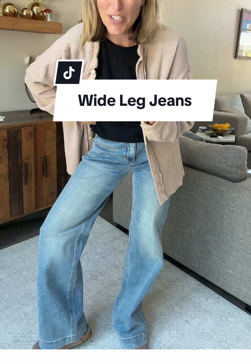TikTok post by @aimeechristine7 for Emma Lous Boutique. Caption reads: These Jeans Are So Comfy They Don’t Even Feel Like....