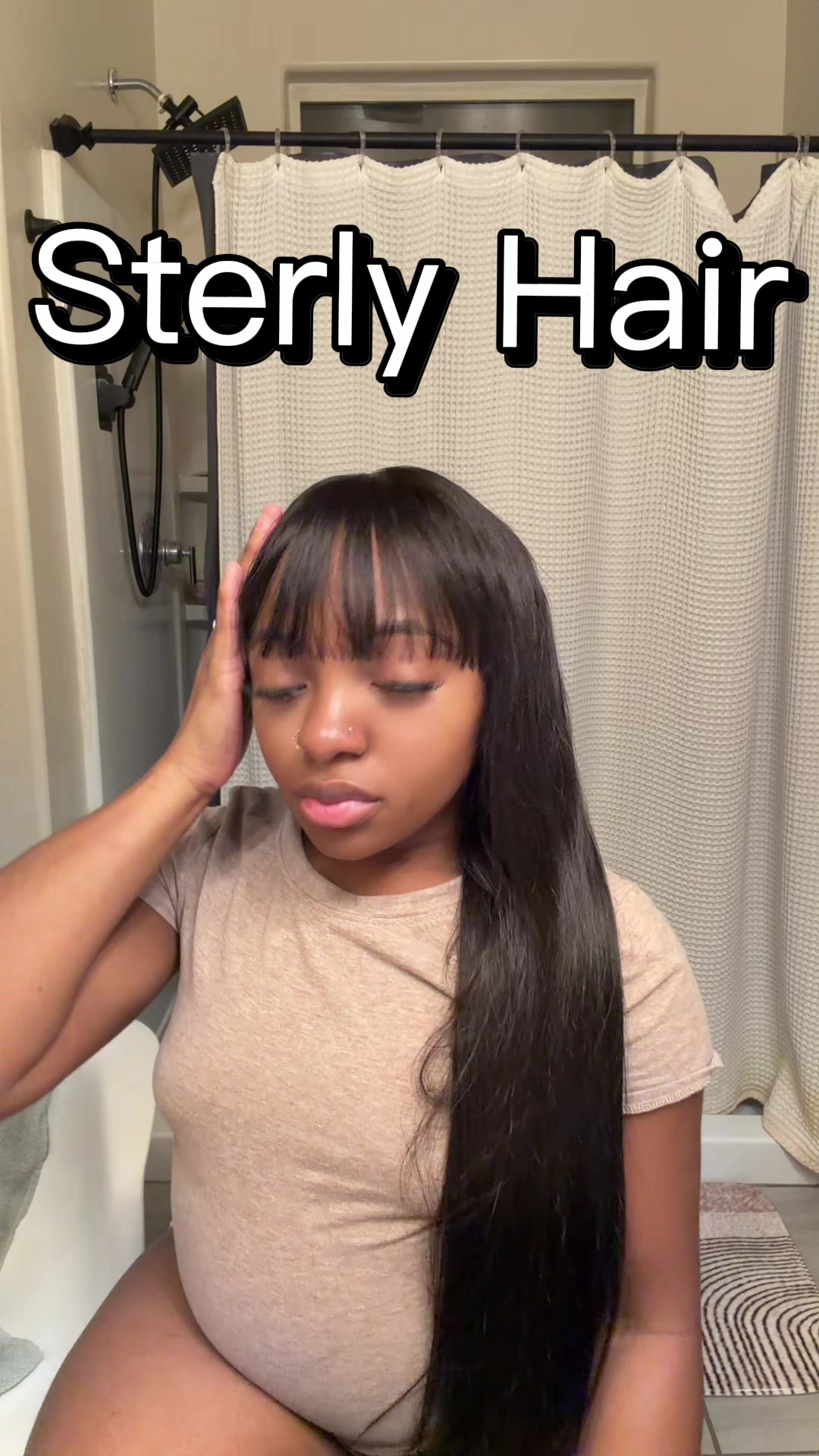 TikTok post by @mama_loux2 for Sterly Hair Shop. Caption reads: This Wig Is A Must Gave Sista @sterlyhair_shop....