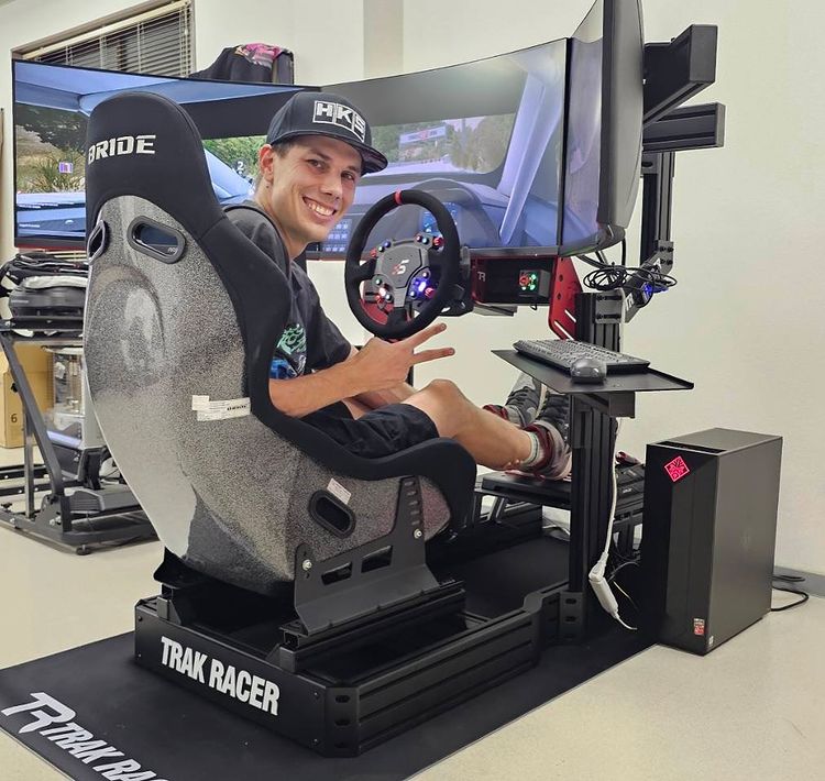 Instagram post by @sammit01 for Simagic. Caption reads: [...] you all that I’m officially on team....