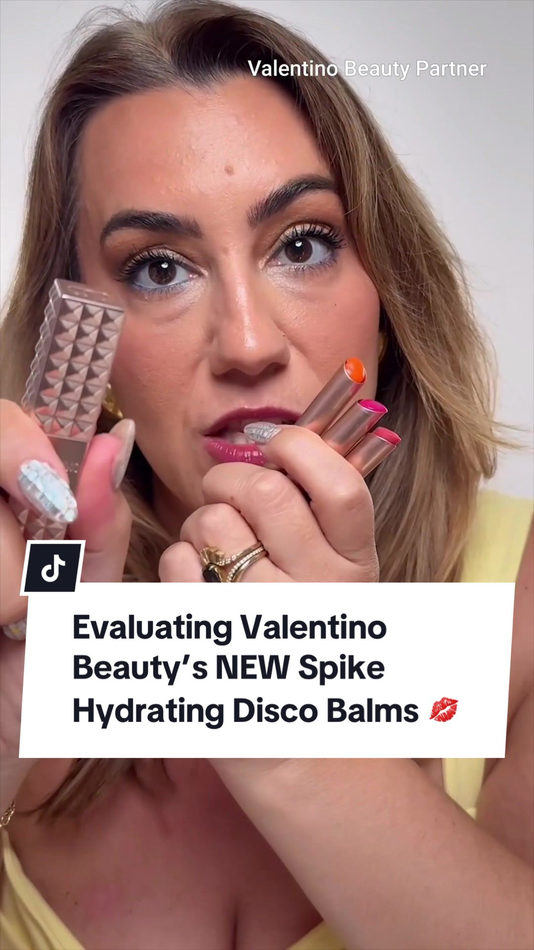 TikTok post by @thelipsticklesbians for Valentino Beauty. Caption reads: #ValentinoBeautyPartner Beauty queens If you've....