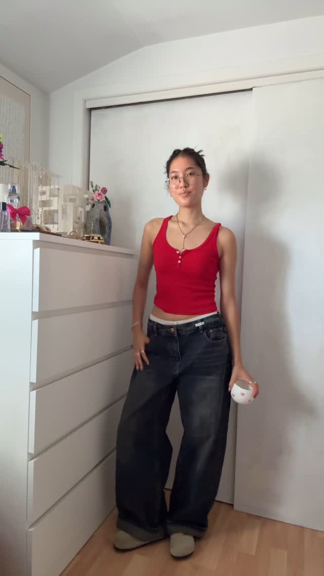 Instagram post by @hhyunjinlee for Brandy Melville. Caption reads: loving these jeans from @emmiolofficial....