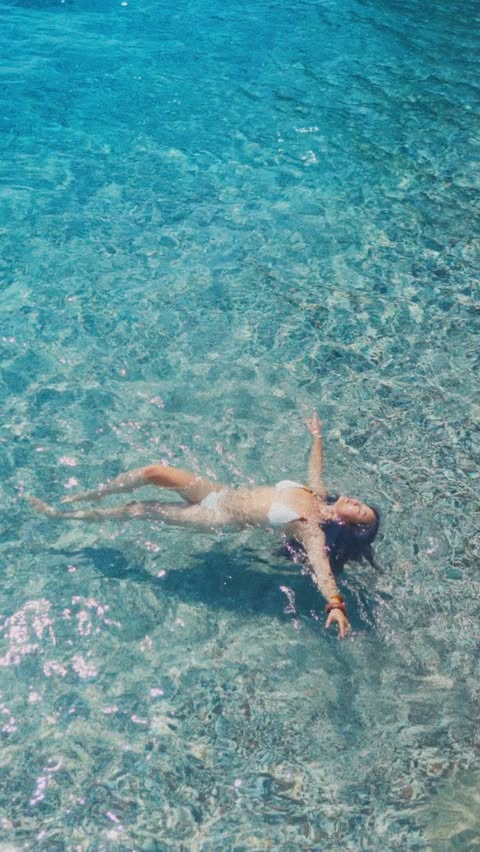 Instagram post by @rxcloe for Acqua di Parma. Caption reads: Summer on an Italy Island. Filmed by @oboahy ,....