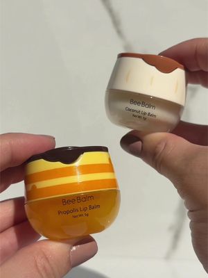TikTok post by @honestlyans for My Bee Balm. Caption reads: @Bee Balm has the CUTEST lip balms! Obsessed with....