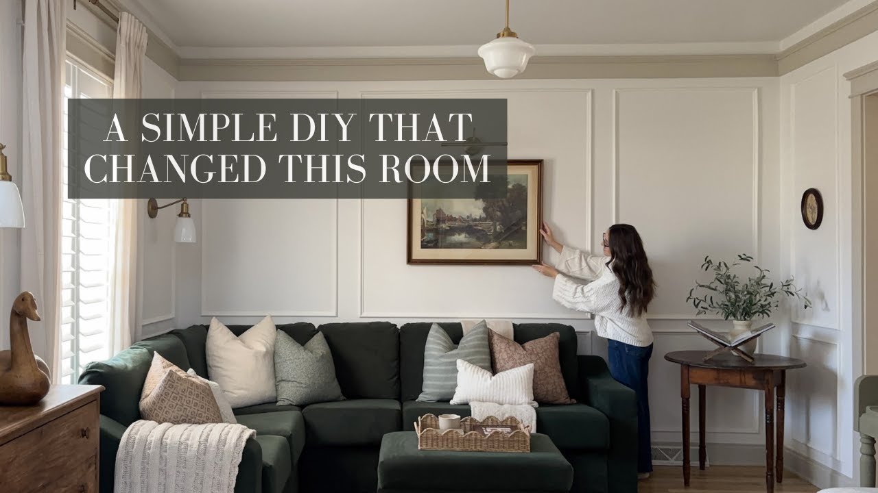 YouTube post by @houseandholm for Lowe's. Caption reads: Adding Character to Our Living Room | DIY Picture....
