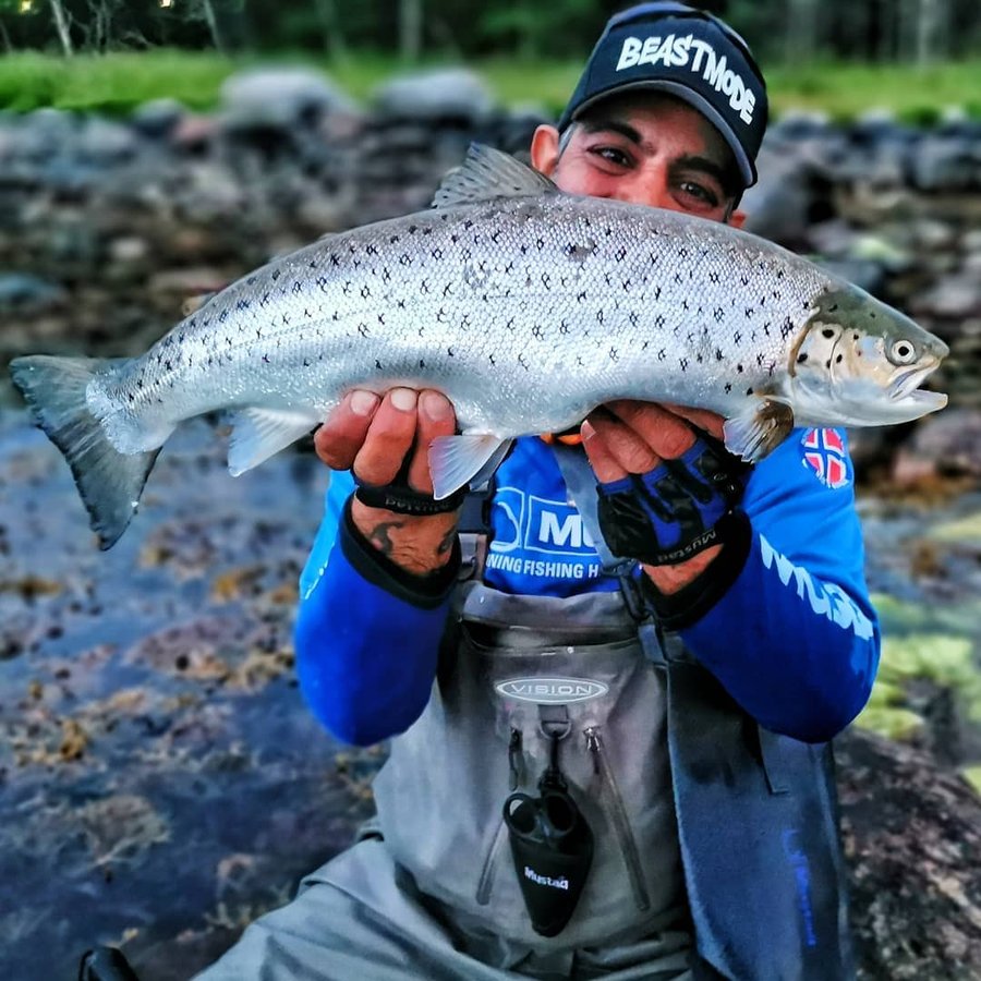 Instagram post by @houtan_ata for Mustad Fishing. Caption reads: [...] wild trout befor season is over....