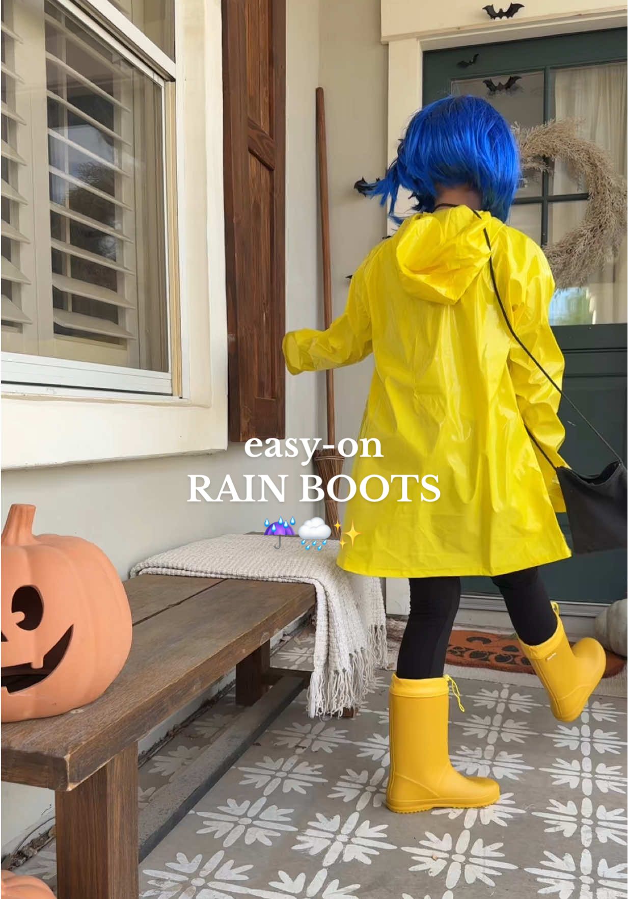 TikTok post by @lollyjaneblog for Dream Pairs. Caption reads: Yellow rain boots that double as a Halloween....