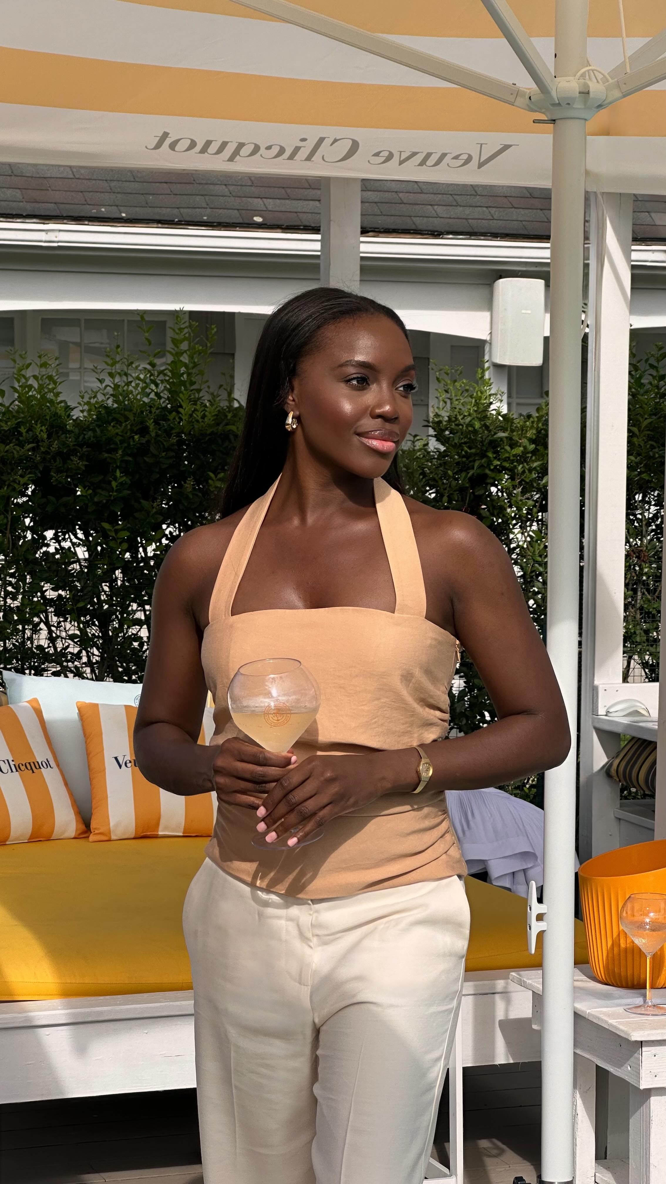 Instagram post by @brenttany_ for Veuve Clicquot. Caption reads: Toasting to a serene summer in the Hamptons with....