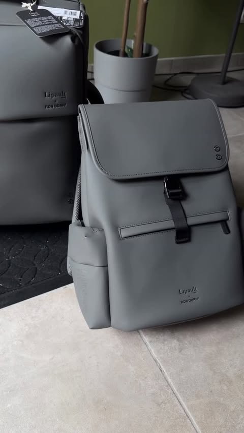 Instagram post by @camerstyle_ for Ron Dorff. Caption reads: A suitcase and a stylish bag for your next trips.