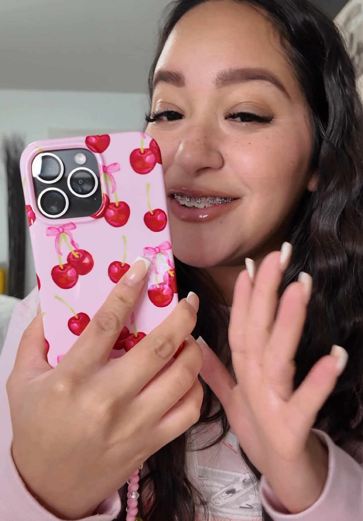TikTok post by @mydlvz1 for VELVET CAVIAR. Caption reads: New phone who dis 🍒✨💕 @velvetcaviar #iphonecase....