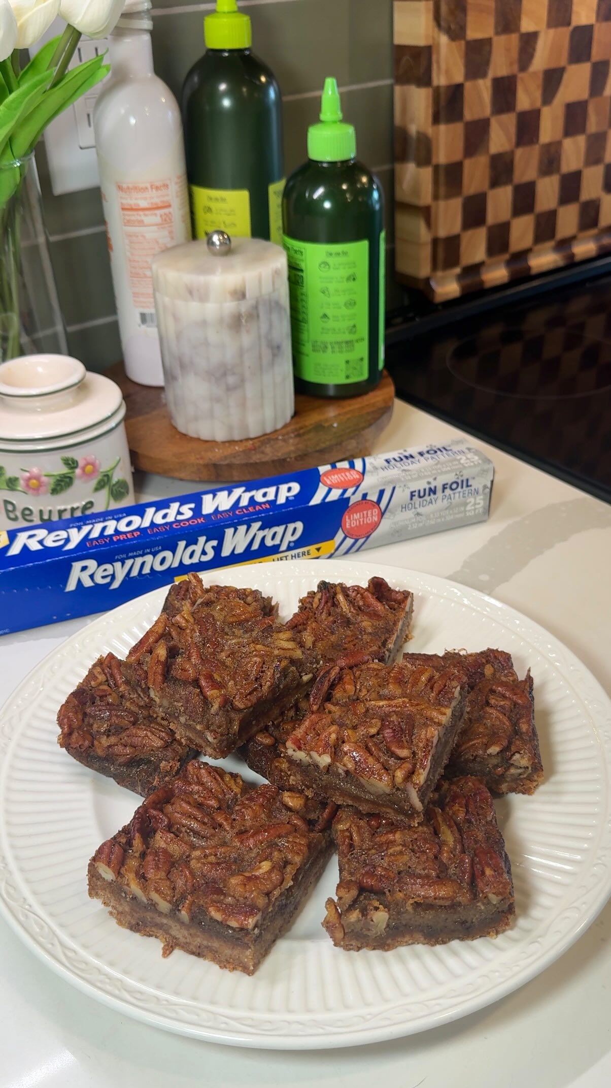Instagram post by @jacialisontodd for Reynolds Brands. Caption reads: The best pecan pie bars 🥧 recipe below!....