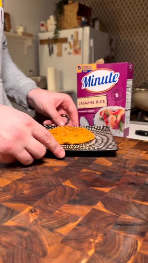 Instagram post by @mr.hollmilkeats for Minute Rice. Caption reads: #ad Crispy Kimchi Rice Cakes 😮‍💨 Recipe 👇

I am....