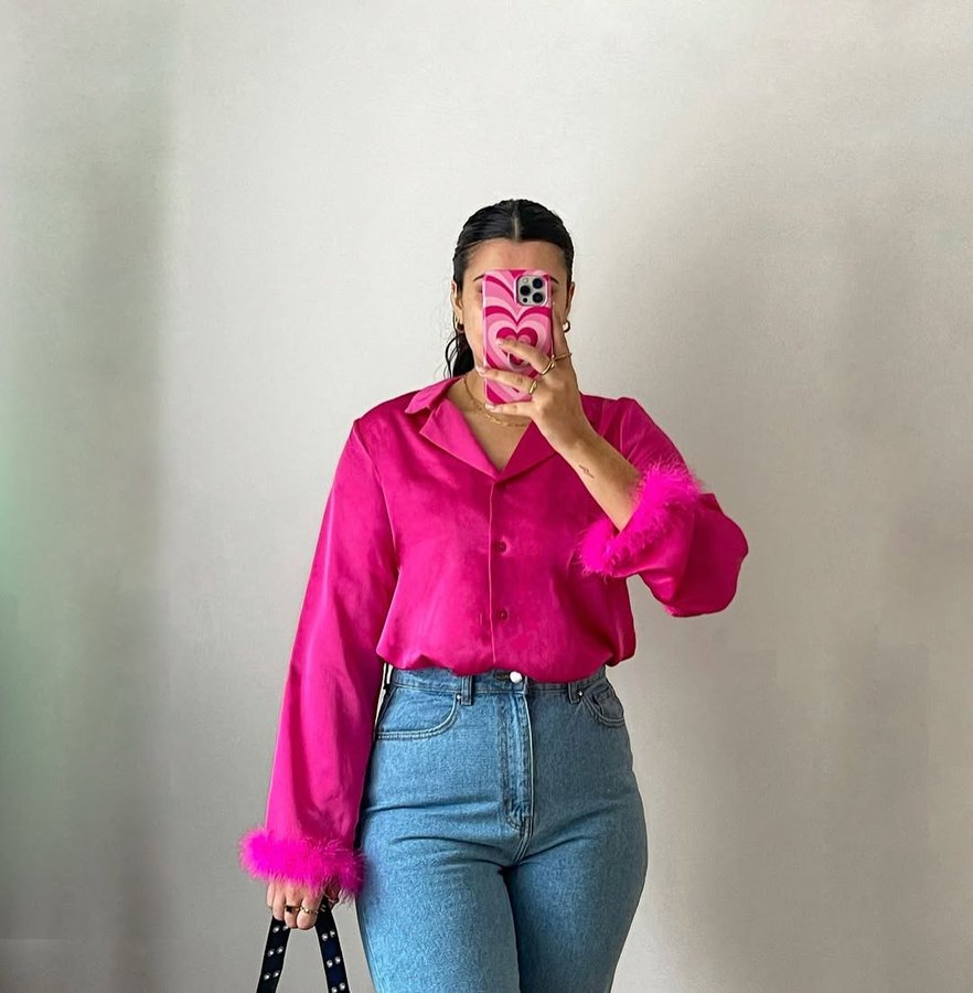 Instagram post by @rosieridgersxx for ISAWITFIRST. Caption reads: make my ✨the✨ shirt but make it pink

The shirt of....