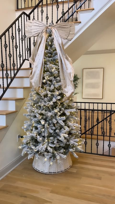 Instagram post by an influencer for King of Christmas. Caption reads: [...] my flocked tree from @kingofchristmas and....