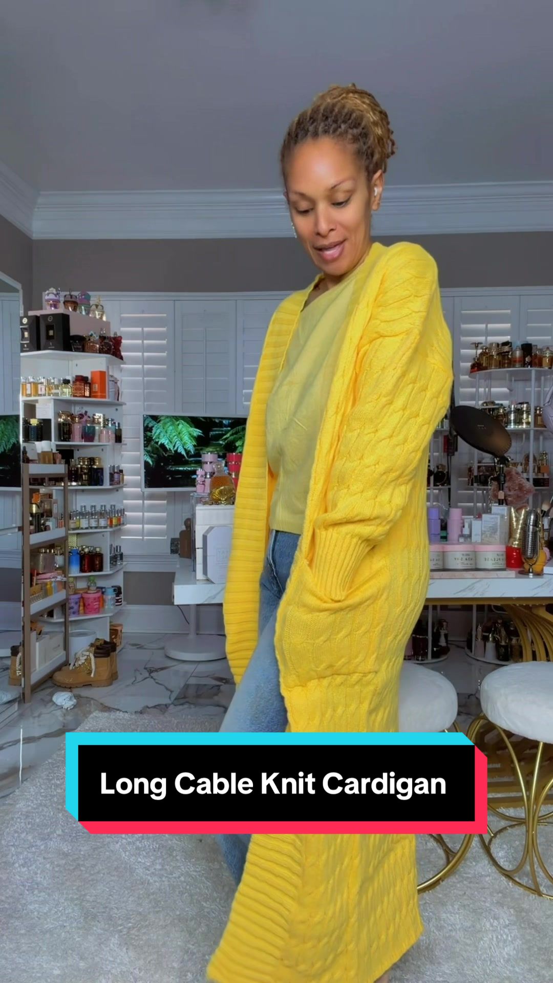 TikTok post by an influencer for USBoutique Chic. Caption reads: [...] cardigan 🤩🤩🤩🤩🤩🤩 @USBoutique Chic....