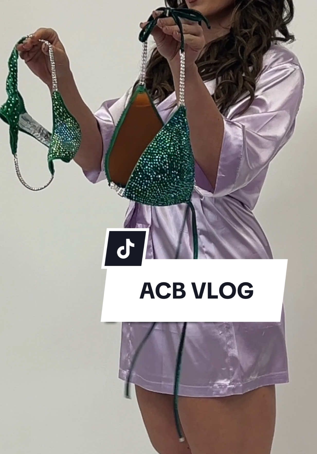 TikTok post by @kenzievancefit for Angel Competition Bikinis. Caption reads: [...] mini vlog from when I went to @Angel....