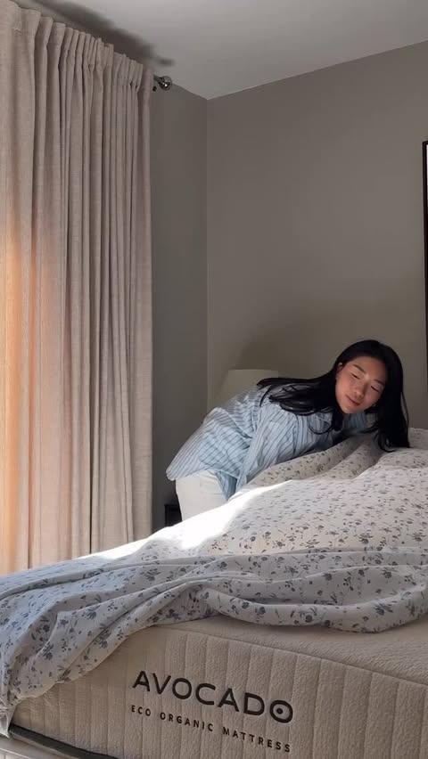 Instagram post by @itsclarajones for Avocado Green Mattress. Caption reads: Refresh the guest room with me ft. @avocado.green!....