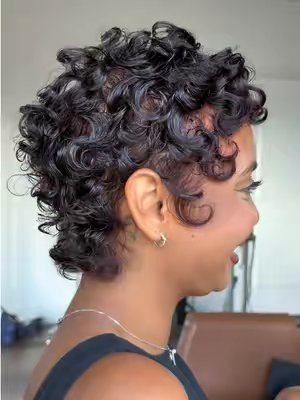 TikTok post by @kendraalia for DevaCurl. Caption reads: [...] intentional with the curl placement.....