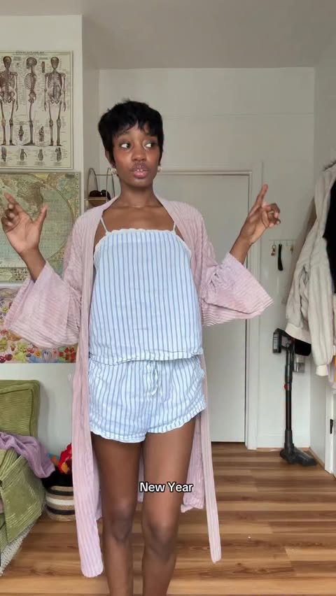 Instagram post by @aminathree for Urban Outfitters. Caption reads: [...] swaggy😎🩰
#UOpartner #UOcommunity....