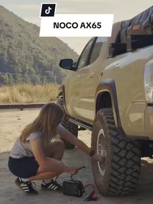 TikTok post by @nicoandyofficial for Noco. Caption reads: The @noco AX65 has you covered, whether you’re....