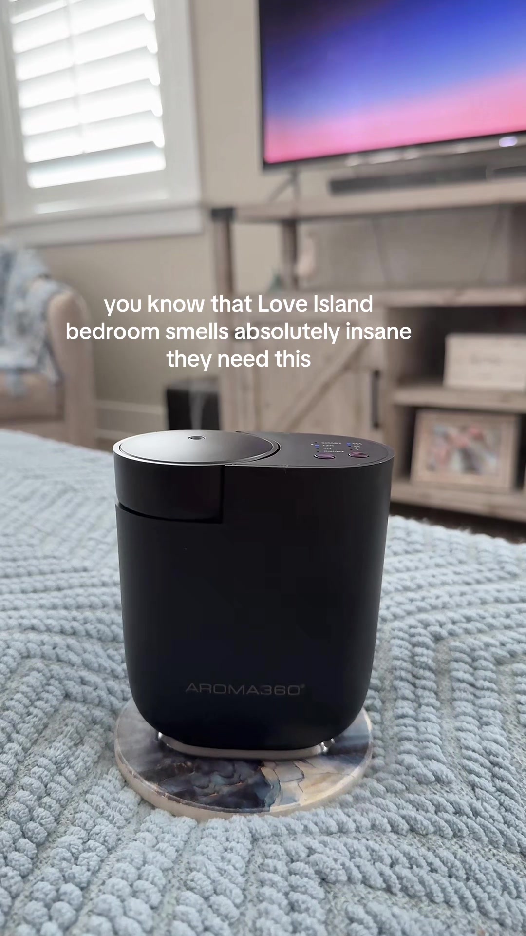 TikTok post by @m_shelll for Aroma360. Caption reads: 🤷🏼‍♀️ @Aroma360 Store #aroma360 #loveisland....